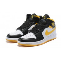 Кроссовки Nike Air Jordan 1 Mid черно-белые с желтым